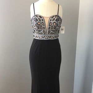 Beaded/illusion bodice gown.